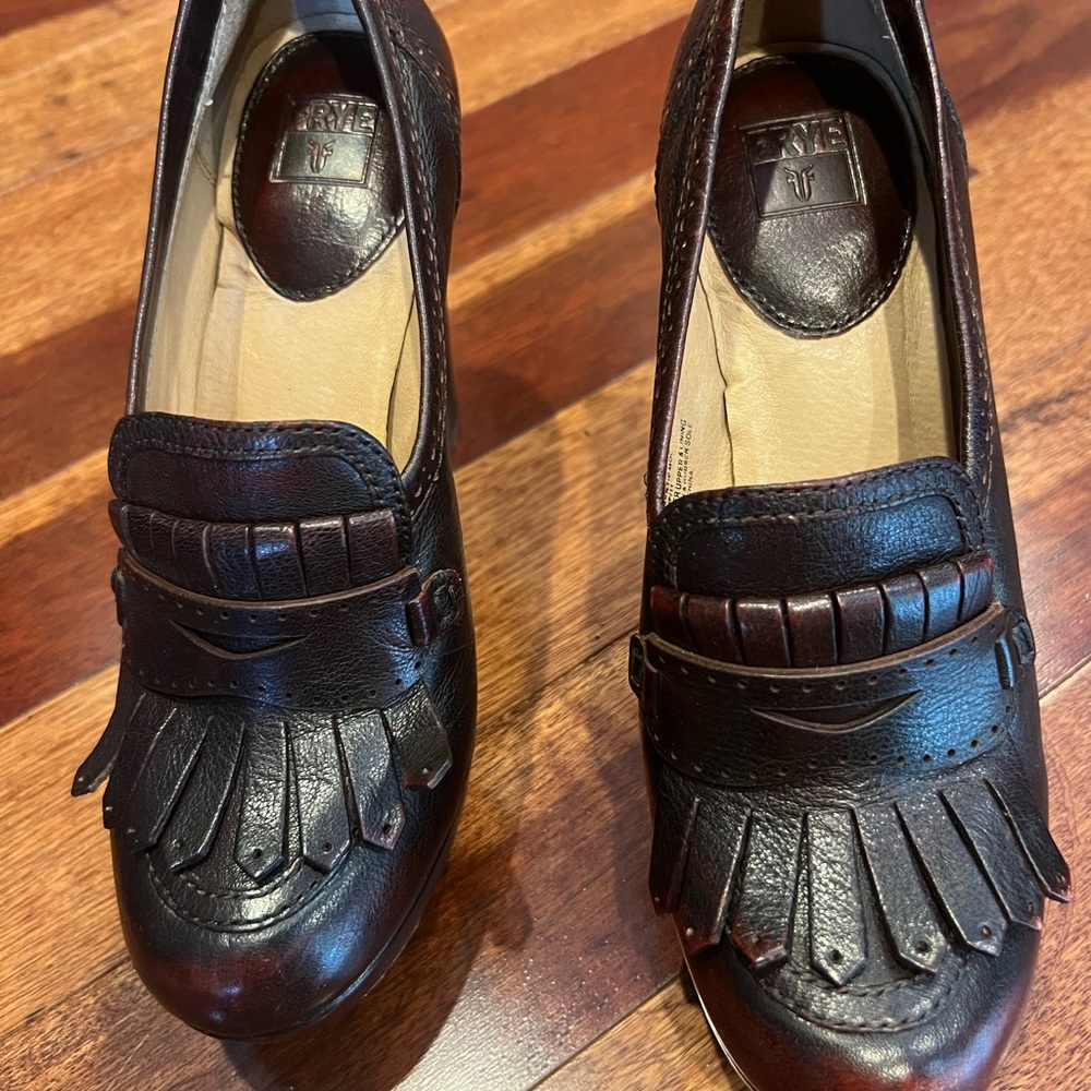 Frye dark brown leather platform pumps.